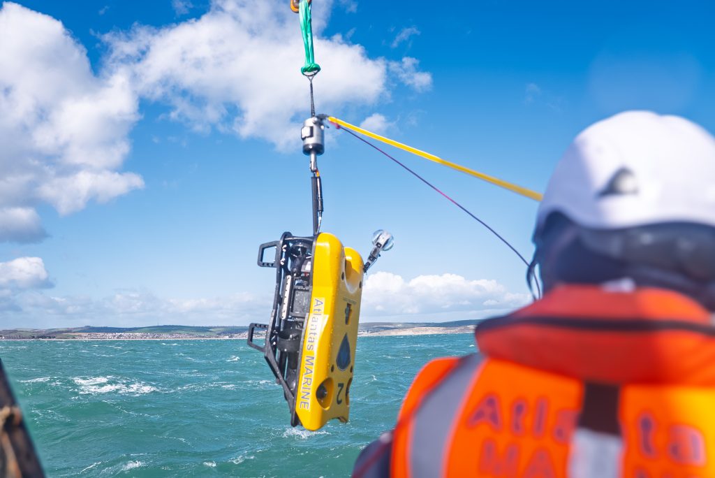 ROV lifted over the side by crane during sea trials