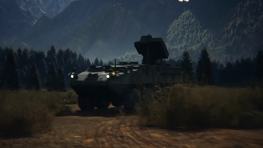 Armoured vehicle carrying the FE-1 launcher in a forest