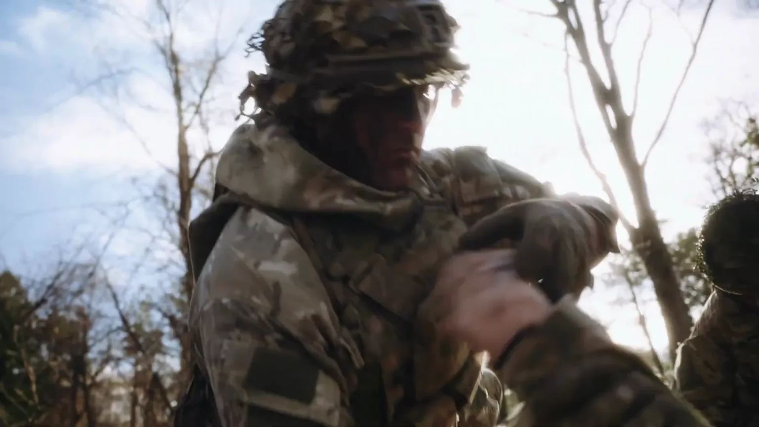 Soldier preparing the folding stretcher in the field