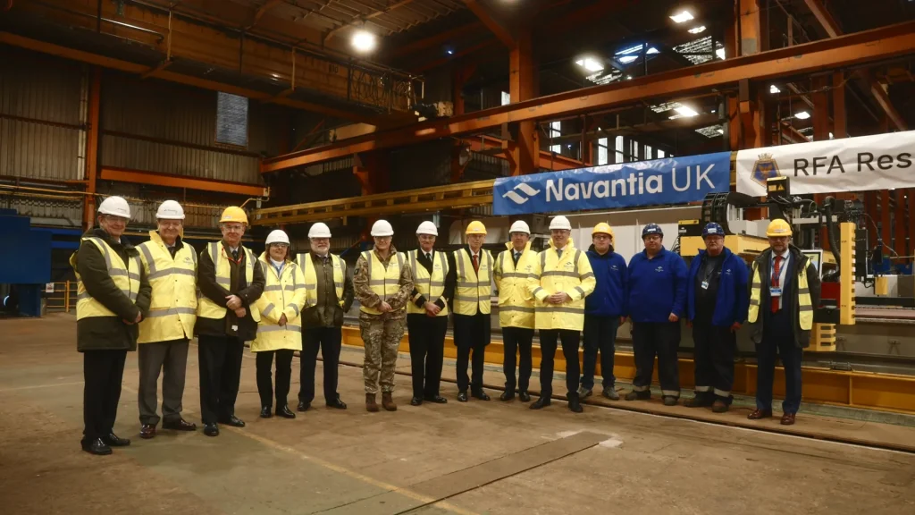 Navantia UK team and guests lined up in the shipyard