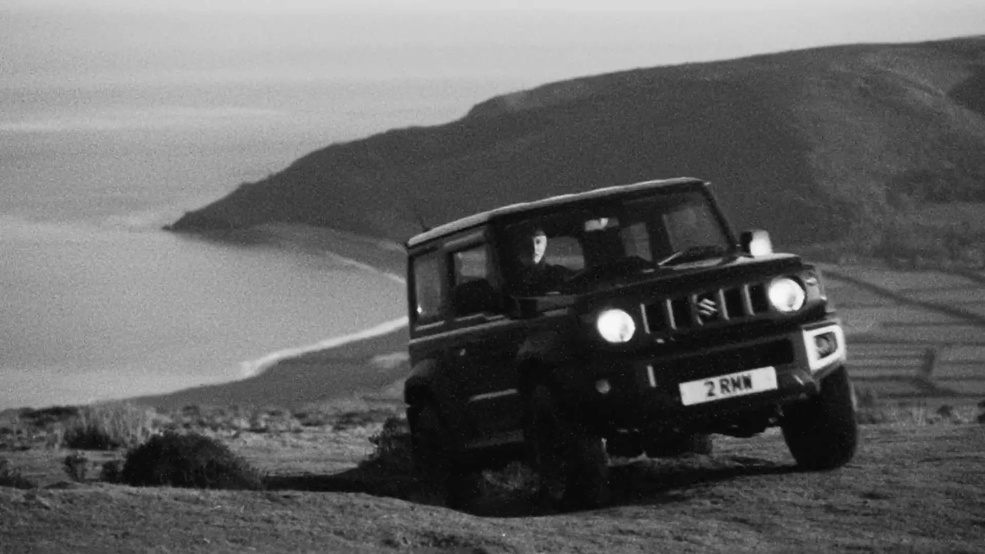 Suzuki Jimny on a coastal hill